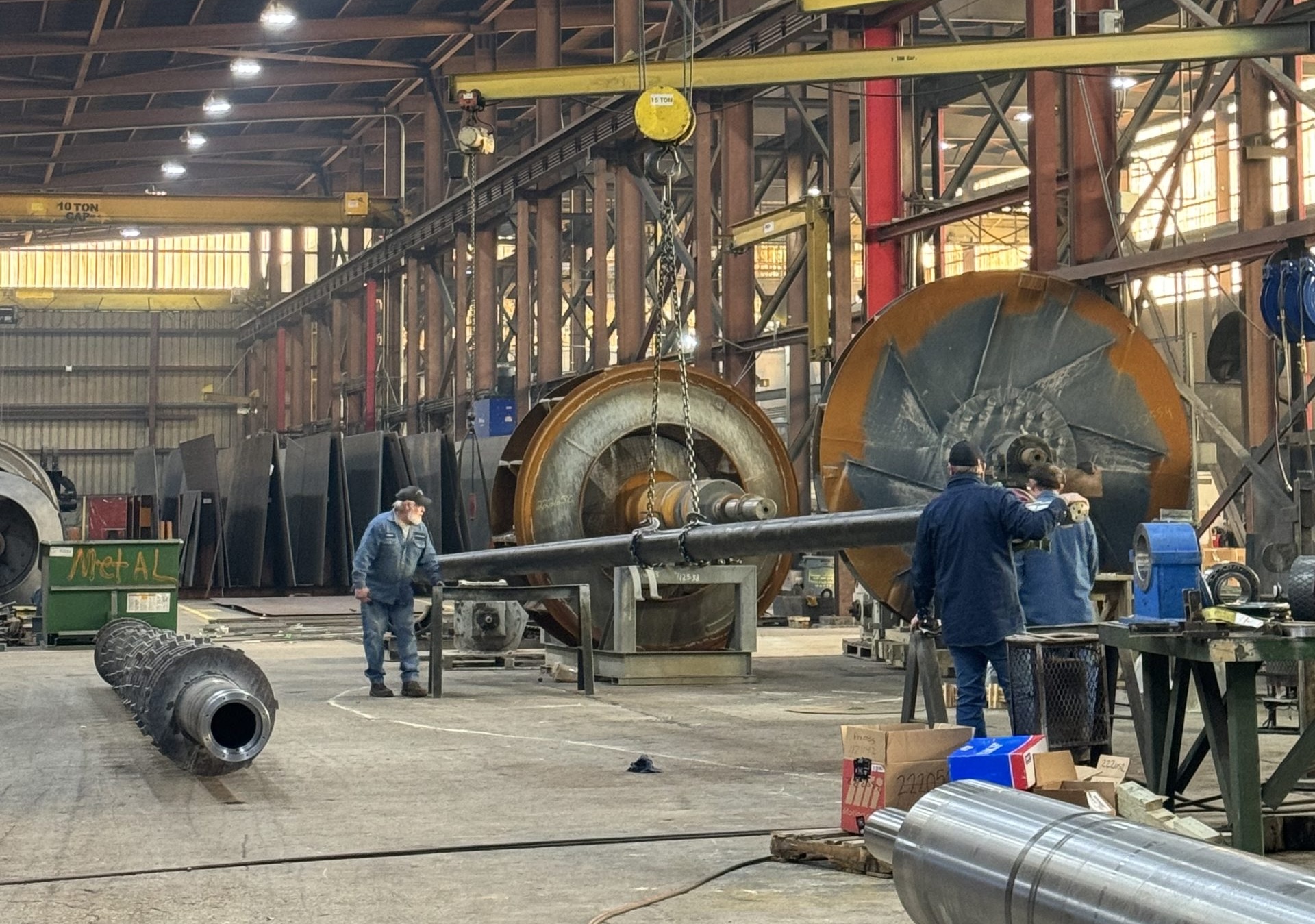 Industrial field service crew in ash and air handling warehouse