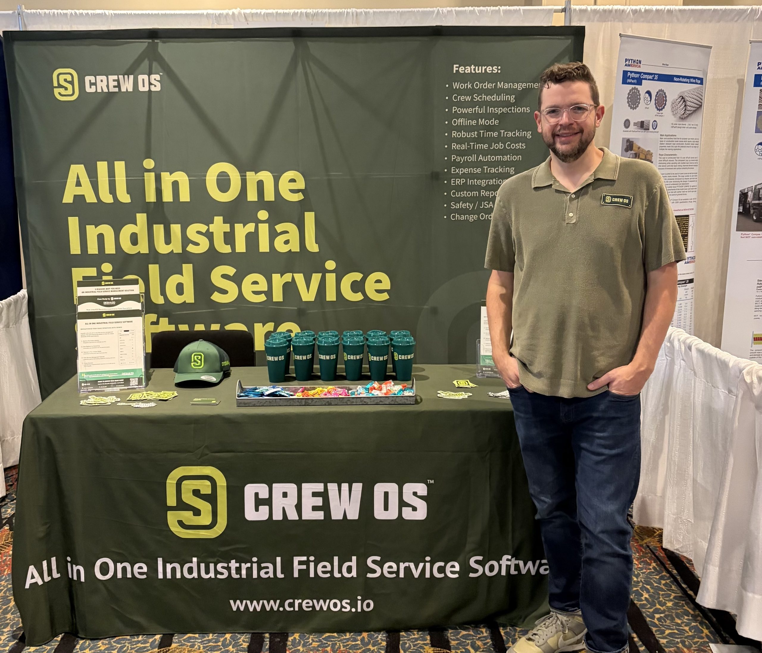 crewOS CEO stands at the company booth at the SC&RA Crane and Rigging Workshop